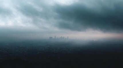 Atmospheric urban skyline shrouded in dense fog and smog under a dramatic overcast sky creating a moody and obscured cityscape view
