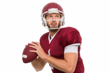 American Football Player's Focus: A focused football player in full uniform, poised to make a strategic play. His gaze intense, and with a steady grip on the ball.