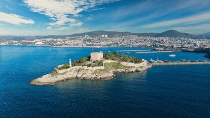 Aerial View of Pigeon Island (Güvercinada) in Kusadasi, Turkey – Historic Fortress Surrounded by the Aegean Sea under Light Clouds