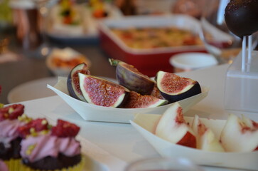 Event Snacks and Desserts with Fresh Fruits and Cupcakes on Table