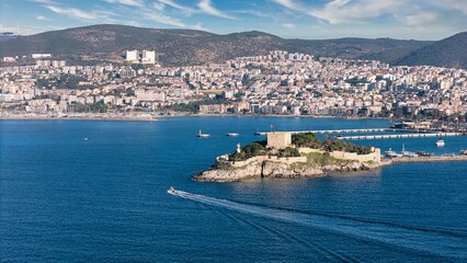 Aerial View of Pigeon Island (Güvercinada) in Kusadasi, Turkey – Historic Fortress Surrounded by the Aegean Sea under Light Clouds