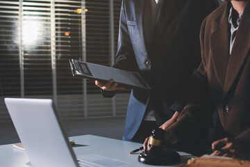 Lawyer explained to the client about the law that must be brought against the court case.