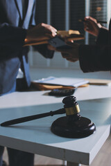 Lawyer explained to the client about the law that must be brought against the court case.