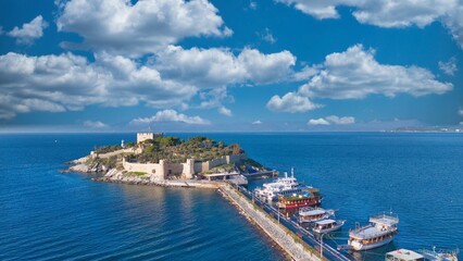 Aerial View of Pigeon Island (Güvercinada) in Kusadasi, Turkey – Historic Fortress Surrounded by the Aegean Sea under Light Clouds