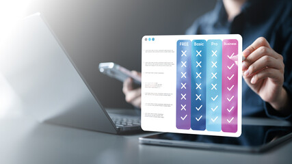pricing, table, compare, plans, monthly, annual, tiers, Hand using tablet with digital pricing...