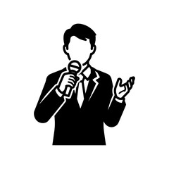 Man in a suit holding a microphone and giving a speech.