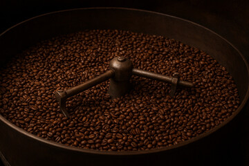 Coffee beans roasting in a professional coffee roaster machine
