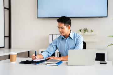 Businessman reading document in office for accounting, finance report and review budget,  financial comparison, proposal information and audit payment.