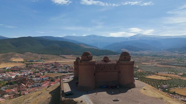 Aerial view of the Renaissance castle of La Calahorra in Granada, Andalusia, Spain, with the Sierra Nevada in the background