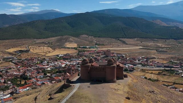 Aerial view of the Renaissance castle of La Calahorra in Granada, Andalusia, Spain, with the Sierra Nevada in the background