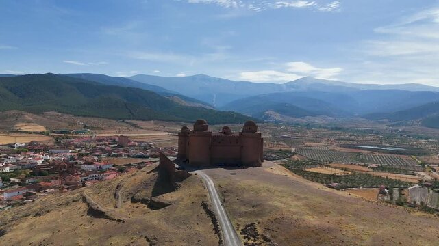 Aerial view of the Renaissance castle of La Calahorra in Granada, Andalusia, Spain, with the Sierra Nevada in the background