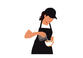 A barista wearing an apron and cap carefully pours steamed milk from a metal pitcher into a cup of coffee, creating latte art.
