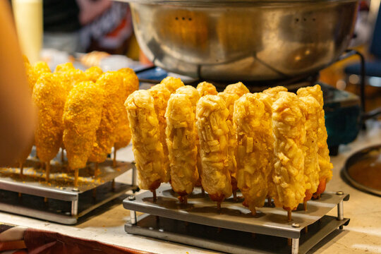 Savory Korean corn dogs ready to eat at street food stall