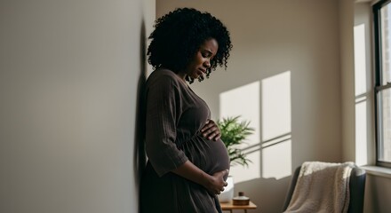pregnant woman sitting on the sofa