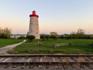 A stone lookout tower on a sunny fall day