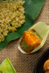 Fresh green rice and salted egg yolk