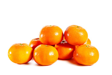 Juicy shiny tangerines isolated on white background.