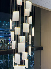 A large chandelier with many small lights hanging from it