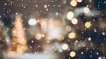 Blurred Christmas winter background with soft falling snow, warm bokeh lights in the background
