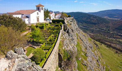 Stone and Sky: The Church of Marv&atilde;o Framed by Fortress Walls in Portugal