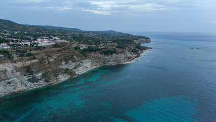 Aerial view of rocky coastline and turquoise sea