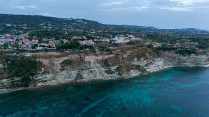 Aerial view of rocky coastline and turquoise sea