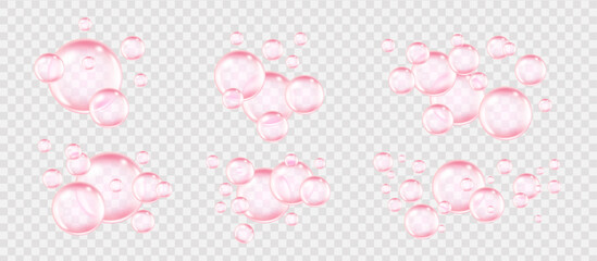 Set of pink collagen bubbles on a transparent background with glossy cosmetic shine.