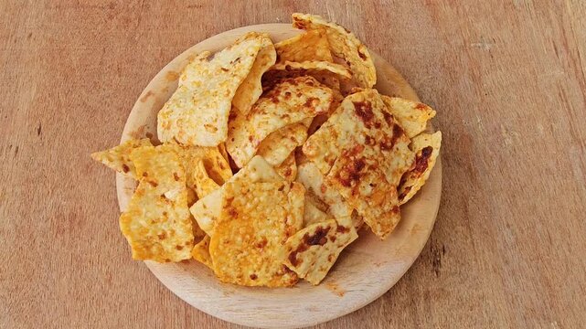 chips and salsa ,Kerupuk or Krupuk Opak balado or Spicy Opak cracker is Indonesian traditional cracker made from cassava dough,crackers coated with chili sauce
