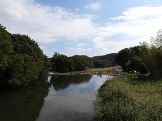 Japanese countryside landscape with the sky reflected in the river