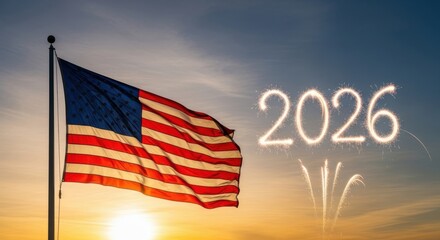 American flag waving in the wind with 2026 written in sparklers at sunset