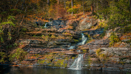 waterfall in autumn forest