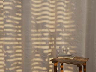 Minimalist product display table with book, candle shadow on sheer curtain.