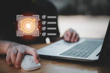 Business planning concept and strategic goal setting and with a businessman pointing at a target icon and checklist. Ideal for success, productivity, project execution and leadership content.