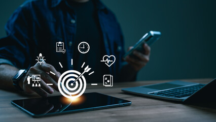 Individual engages digital tablet, stylus activates floating conceptual icons. Business strategy, innovation, health management, time planning, financial growth, teamwork embody modern digital