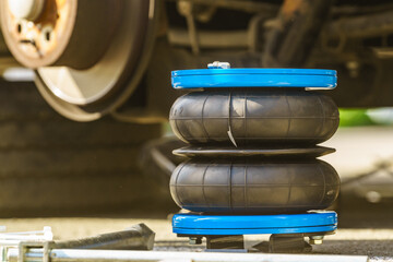 Car in service. Installing air ride suspension.