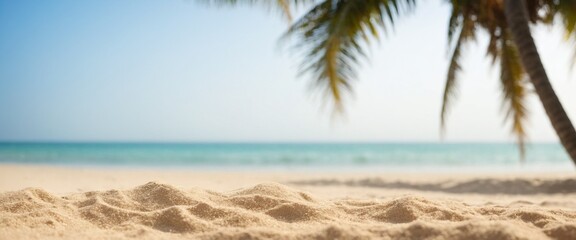 Sand with blurred Palm and tropical beach bokeh background Summer vacation and travel concept