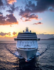 Naklejka premium Cruise ship sailing toward the sunset