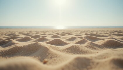 sunlit textured sand dunes on a tranquil beach with soft distant sea horizon
