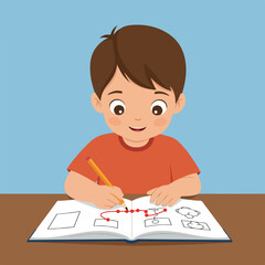Young boy with brown hair in orange shirt draws on notebook with pencil