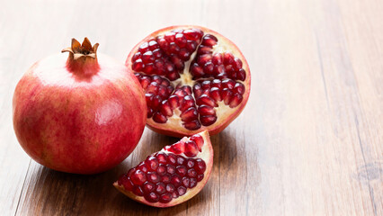 Pomegranate on wooden table