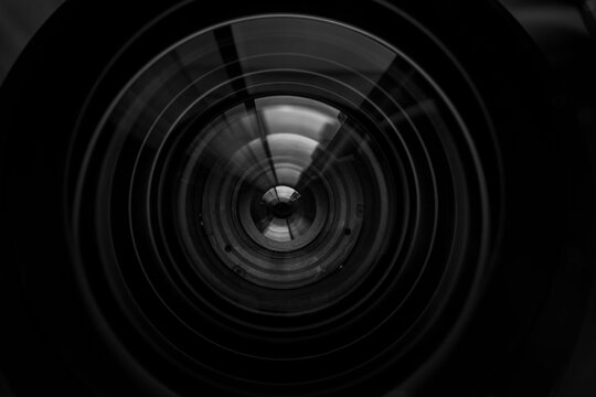 Close-up macro video camera lens,Photo Camera or Video lens close-up on black background DSLR objective,Mirrorless camera.