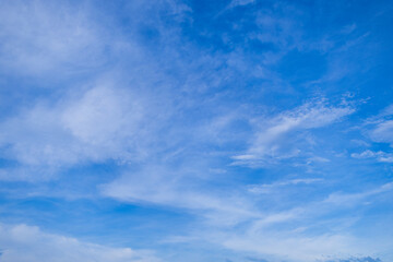 Daytime sky and clouds,blue sky background with white clouds.Sky clouds.Sky with white clouds.