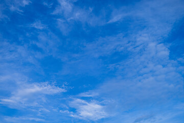 Daytime sky and clouds,blue sky background with white clouds.Sky clouds.Sky with white clouds.