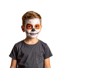 A boy with intricate skull face paint featuring orange accents and a playful expression.