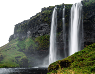 A stunning waterfall cascades down a rocky cliff, surrounded by lush green vegetation and flowing water in a serene natural landscape.