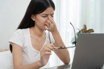 Eye problems, Asian women use hand cover eyes due to eye irritation, eye rubbing, dry, eye pain...