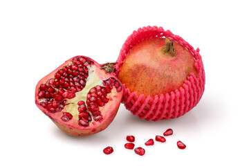 Ripe pomegranates. Pomegranates may be sold in protective netting.