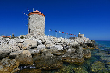 Rhodes windmills. Beautiful concept for travel and vacation in Greece.