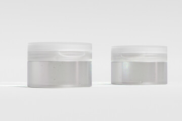 translucent cream jar with beauty spatula mockup, cosmetic cleansing balm packaging, cylindrical Cream jar with Flip top Cap, skincare container with spoon, Body Scrub product bottle container mockup