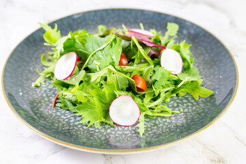 Healthy fresh green salad plate